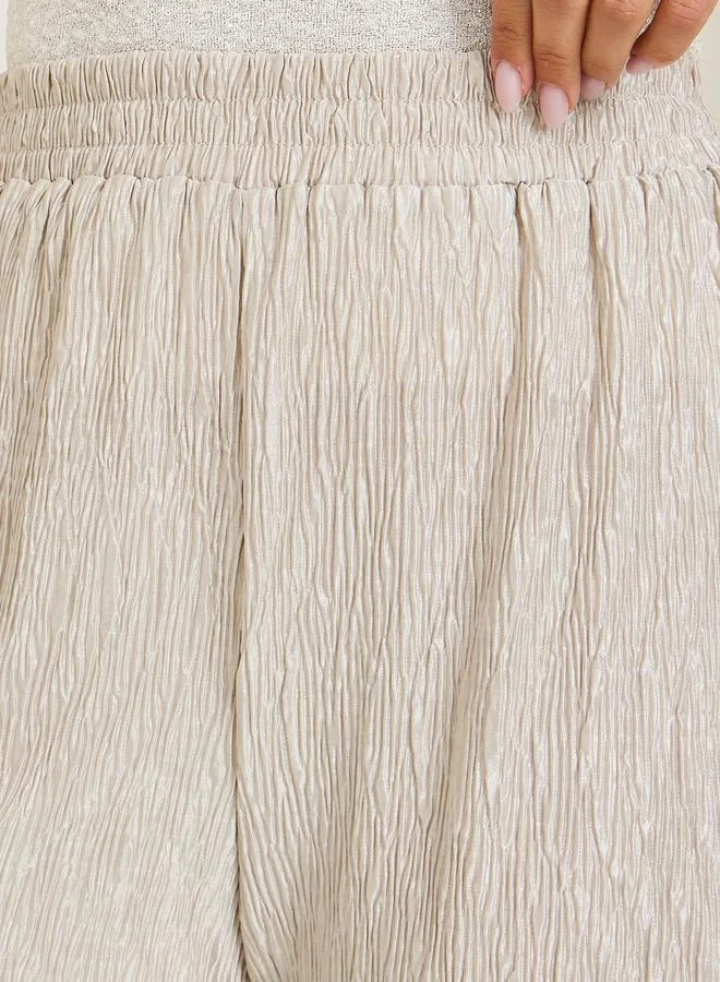 Styli Women Cream Textured Wide Leg Trousers